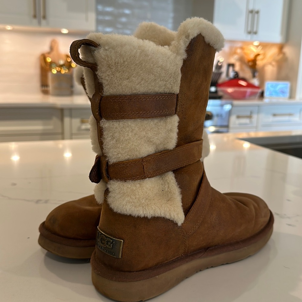 UGG chestnut color boot with buckle detail